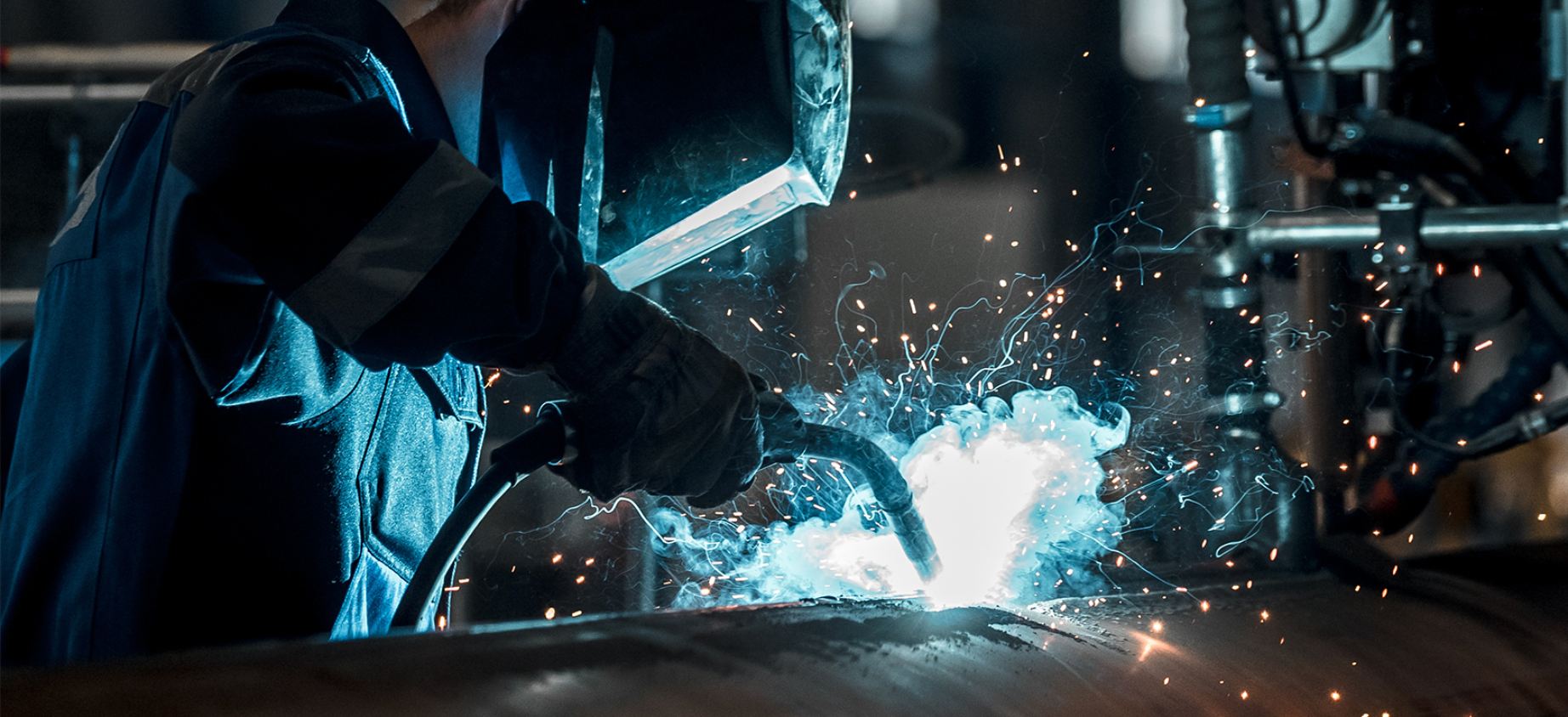 photo: a welder wearing protective gear